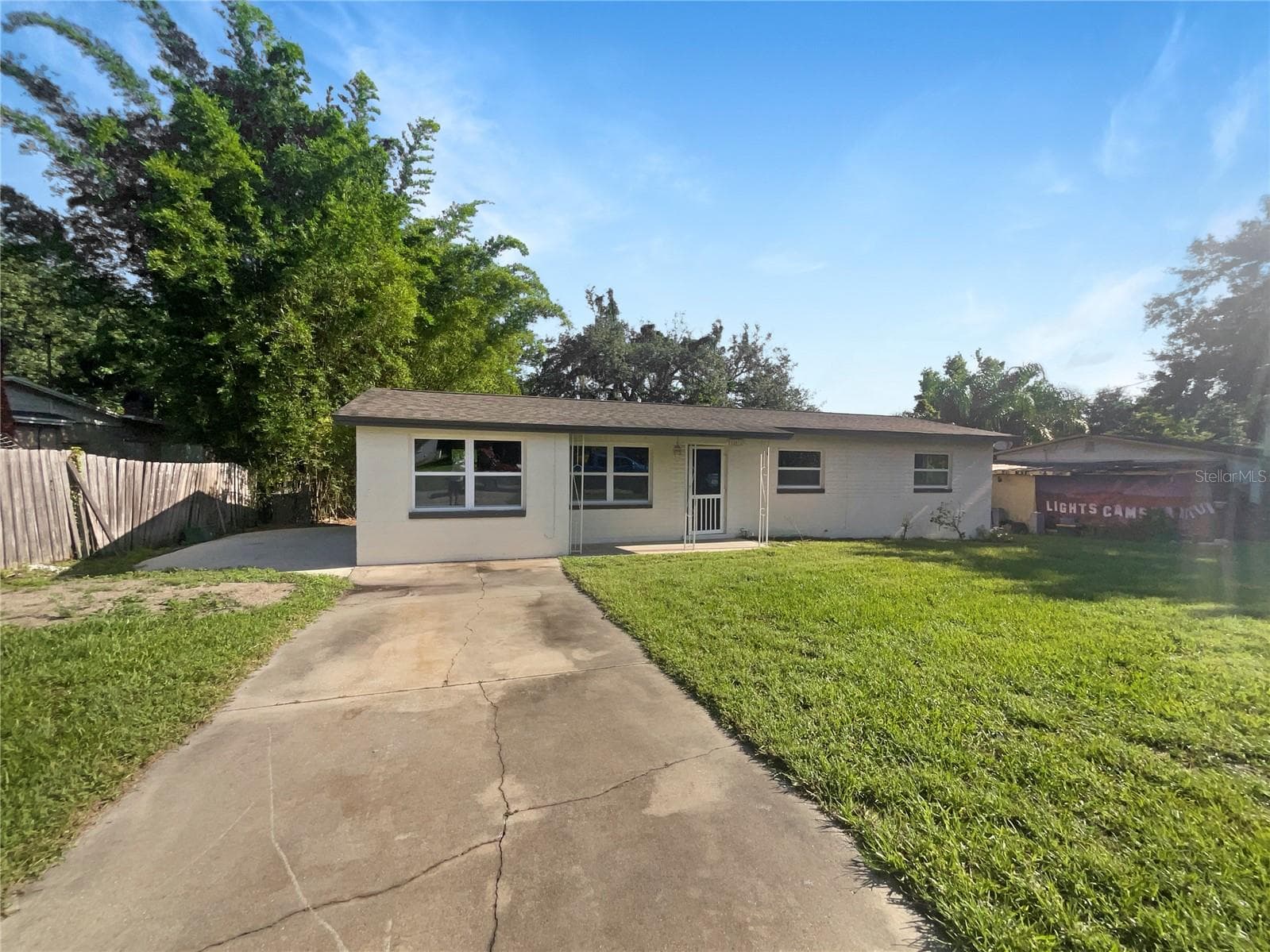 Freshly painted exterior of a single-family home on a large lot in Altamonte Springs