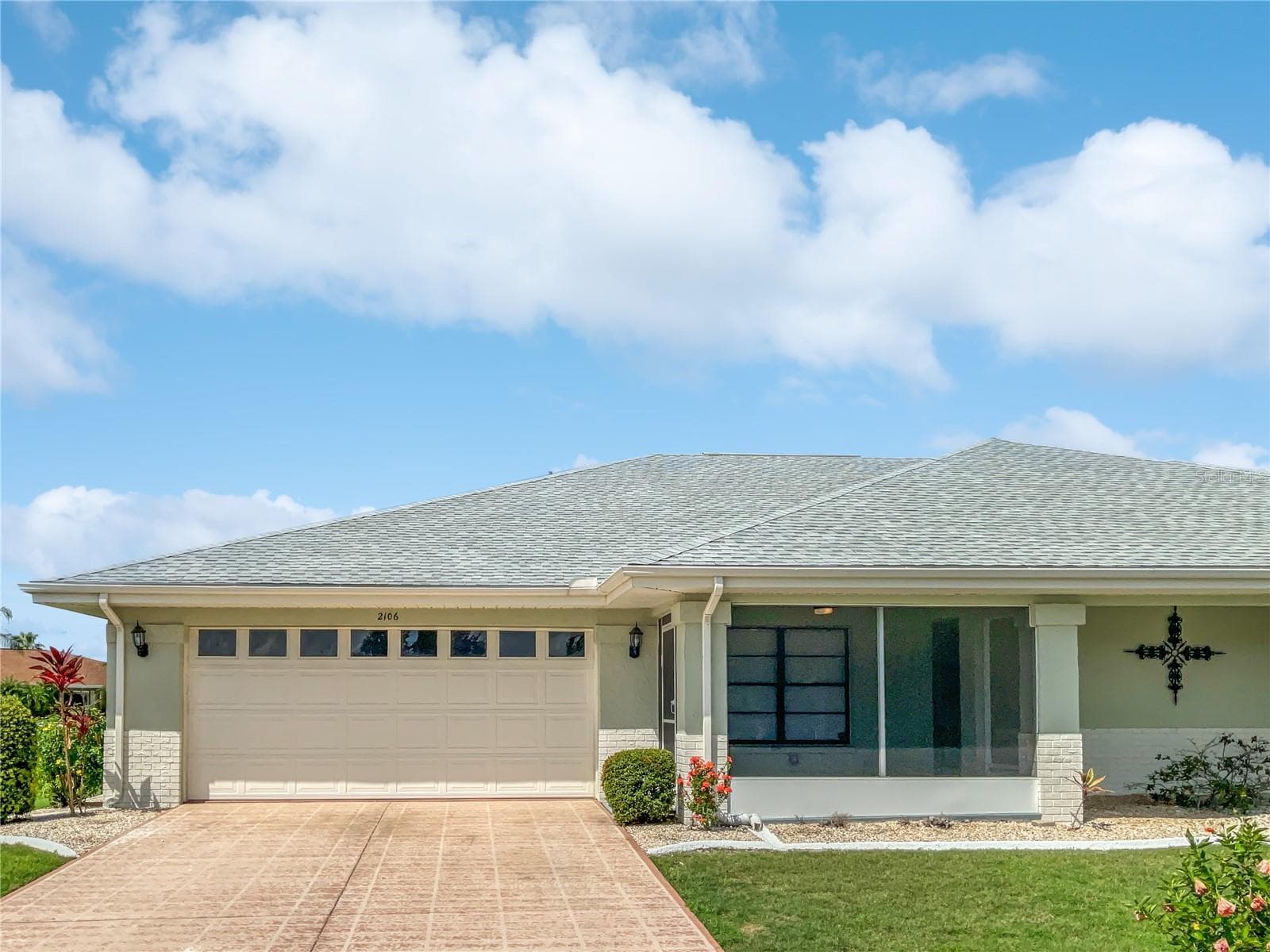 Exterior view of a two-bedroom townhouse on a 0.14-acre lot in Sun City Center, FL