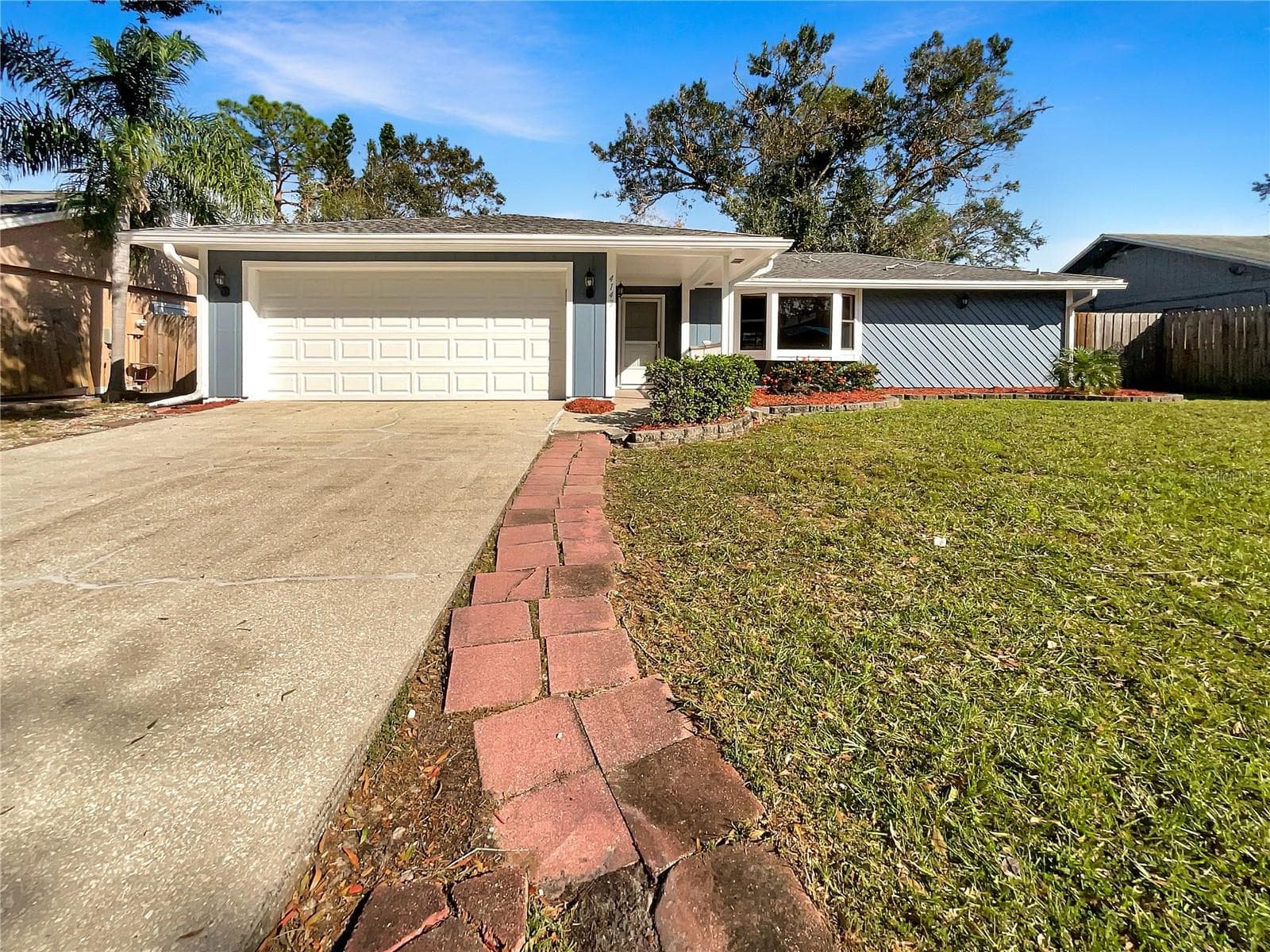 Front exterior of a single-family home in Sarasota's Lake Sarasota neighborhood.