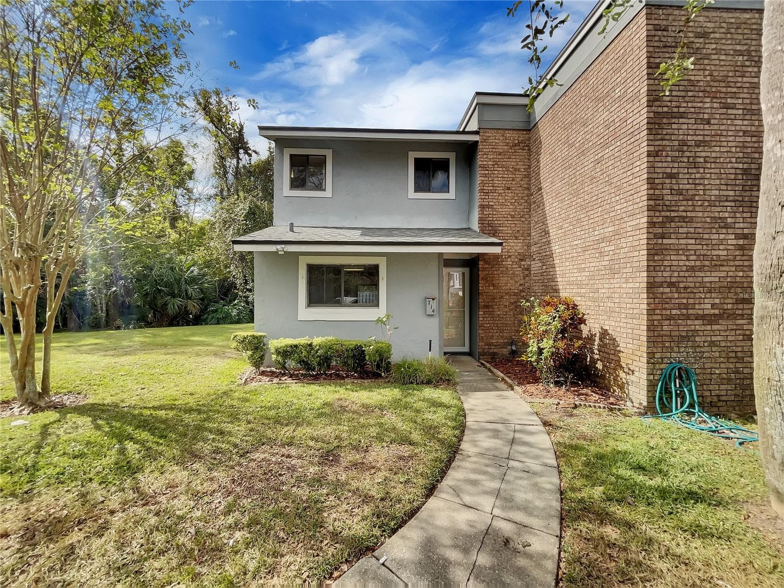 Exterior view of a two-story townhouse at 714 Saint Michael Lane, Altamonte Springs