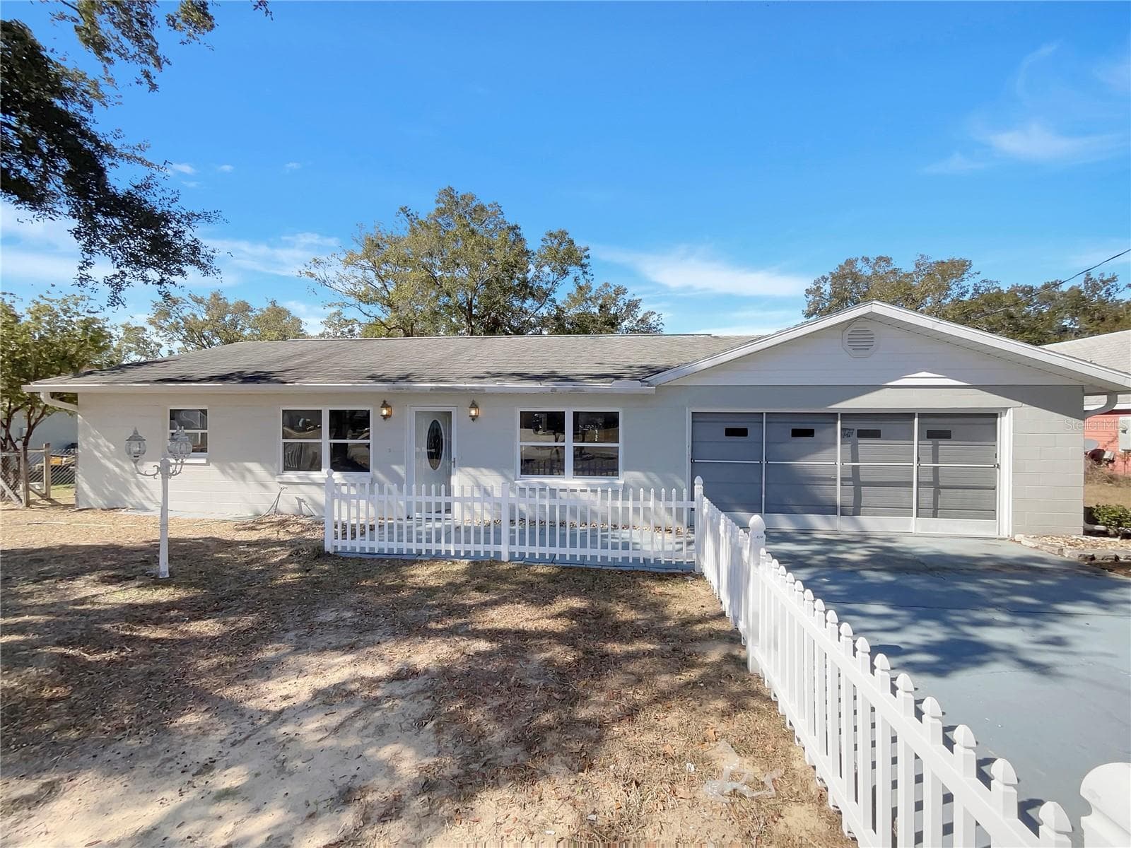 Front exterior of a single-family home in Summerfield Florida on a 0.22-acre lot